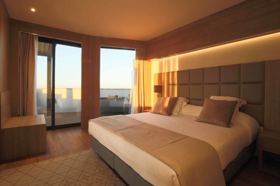 Suite, Sea View (Paradis) | Minibar, in-room safe, desk, blackout drapes