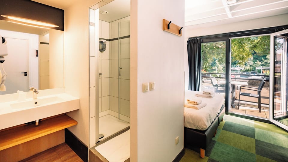Double Room, Balcony | Blackout drapes, free WiFi, bed sheets