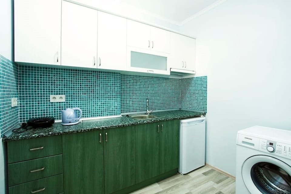 Apartment, 2 Bedrooms | Private kitchenette | Fridge, stovetop, electric kettle, toaster