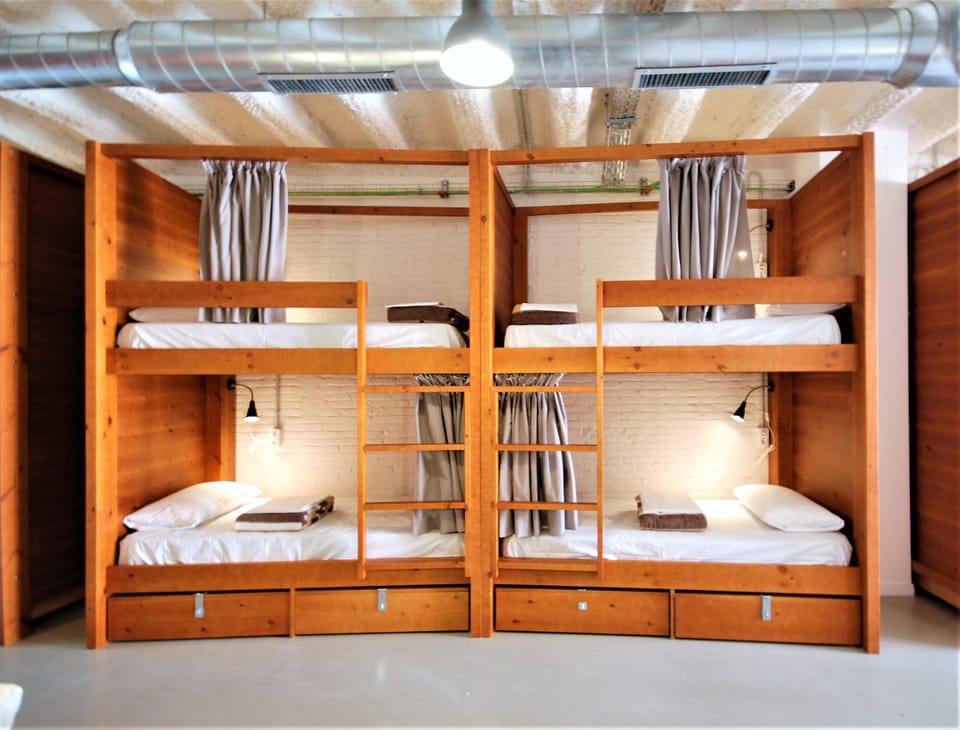 Comfort Shared Dormitory, Mixed Dorm, Accessible, City View | Premium bedding, blackout drapes, soundproofing, free WiFi