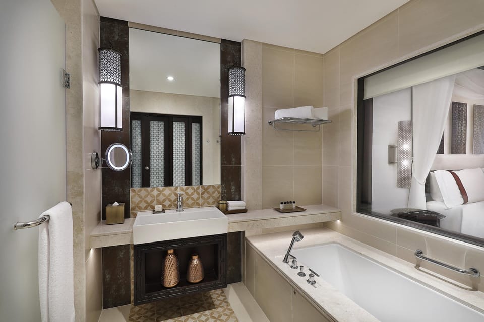 Separate tub and shower, deep soaking tub, rainfall showerhead