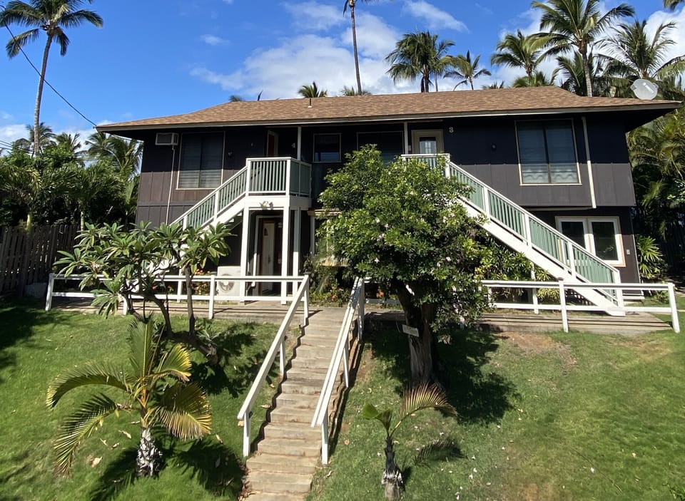 Beach is in the back of building. Stairs are required for access to all units.