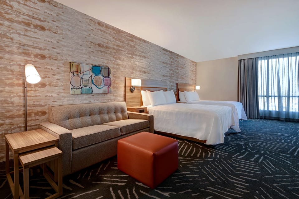 Premium bedding, individually furnished, desk, laptop workspace