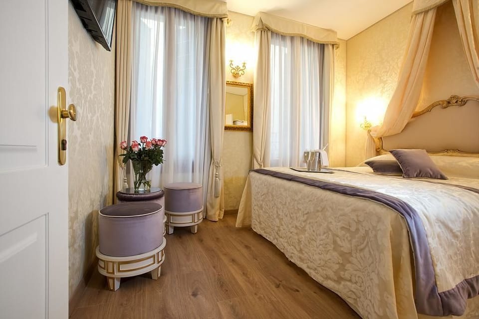Down comforters, pillowtop beds, in-room safe, desk