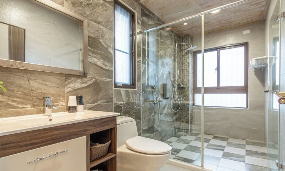 Shower, free toiletries, hair dryer, slippers