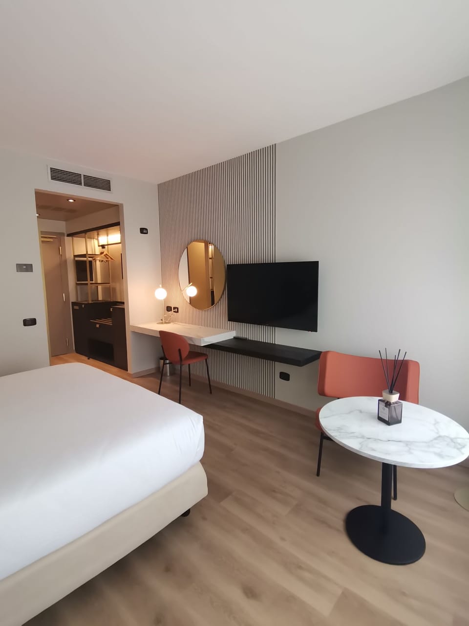 Premium bedding, down comforters, memory foam beds, minibar