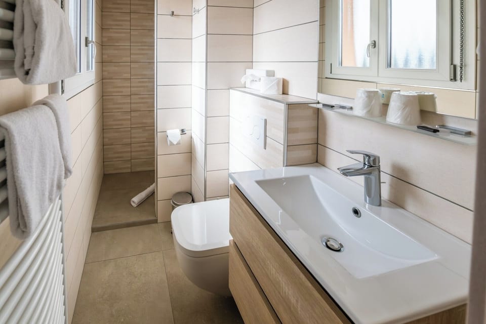 Superior Double or Twin Room | Bathroom | Deep soaking tub, free toiletries, hair dryer, towels