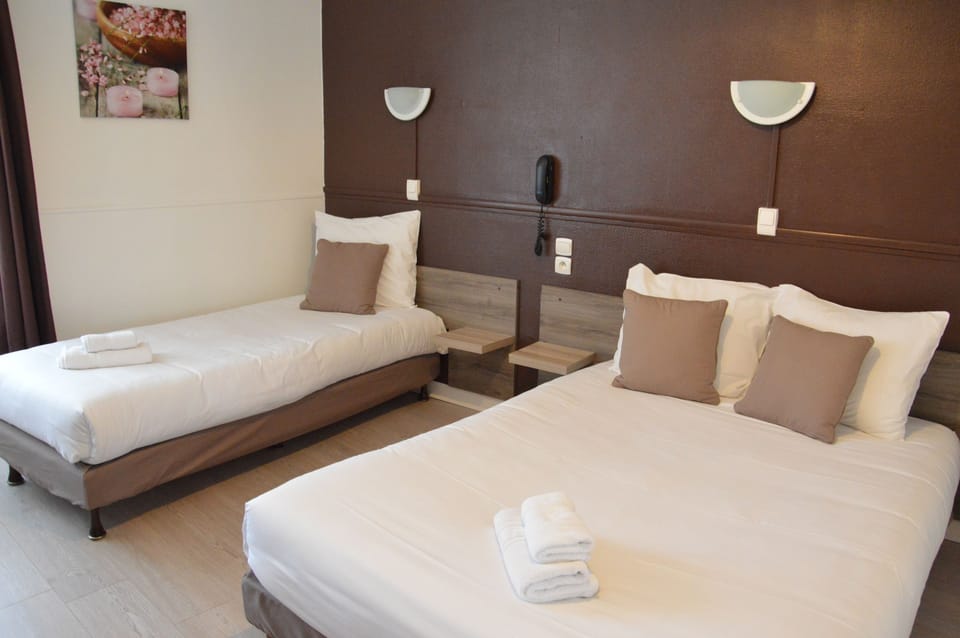Standard Triple Room, Multiple Beds | Free WiFi, bed sheets