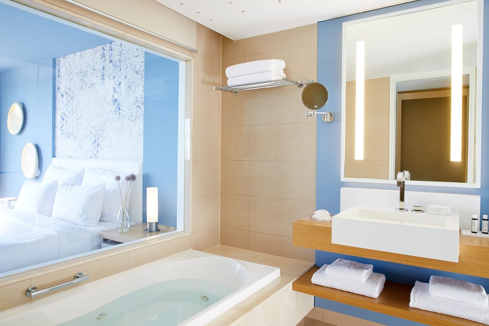 Separate tub and shower, jetted tub, designer toiletries, hair dryer