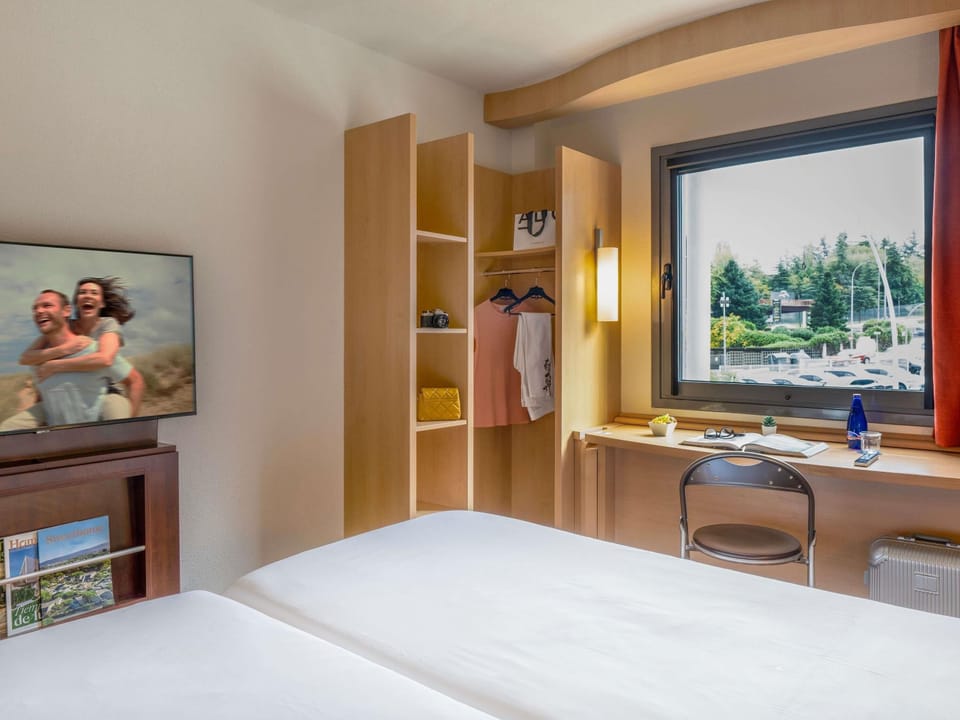 Standard Room, 2 Twin Beds | Down comforters, in-room safe, desk, blackout drapes