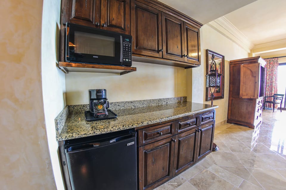 Luxury Room, 1 Bedroom, Ocean View (Superior) | Private kitchenette | Coffee/tea maker