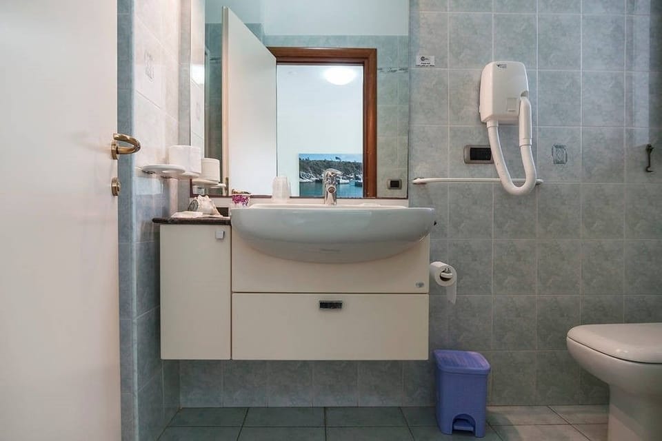 Shower, free toiletries, hair dryer, bathrobes