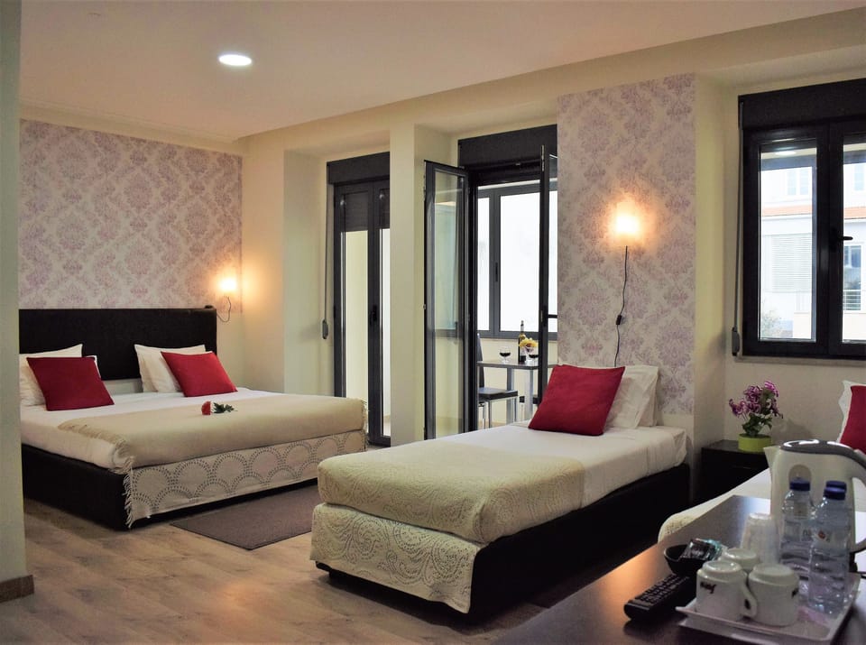 Family Suite, Private Bathroom | Desk, blackout drapes, soundproofing, iron/ironing board