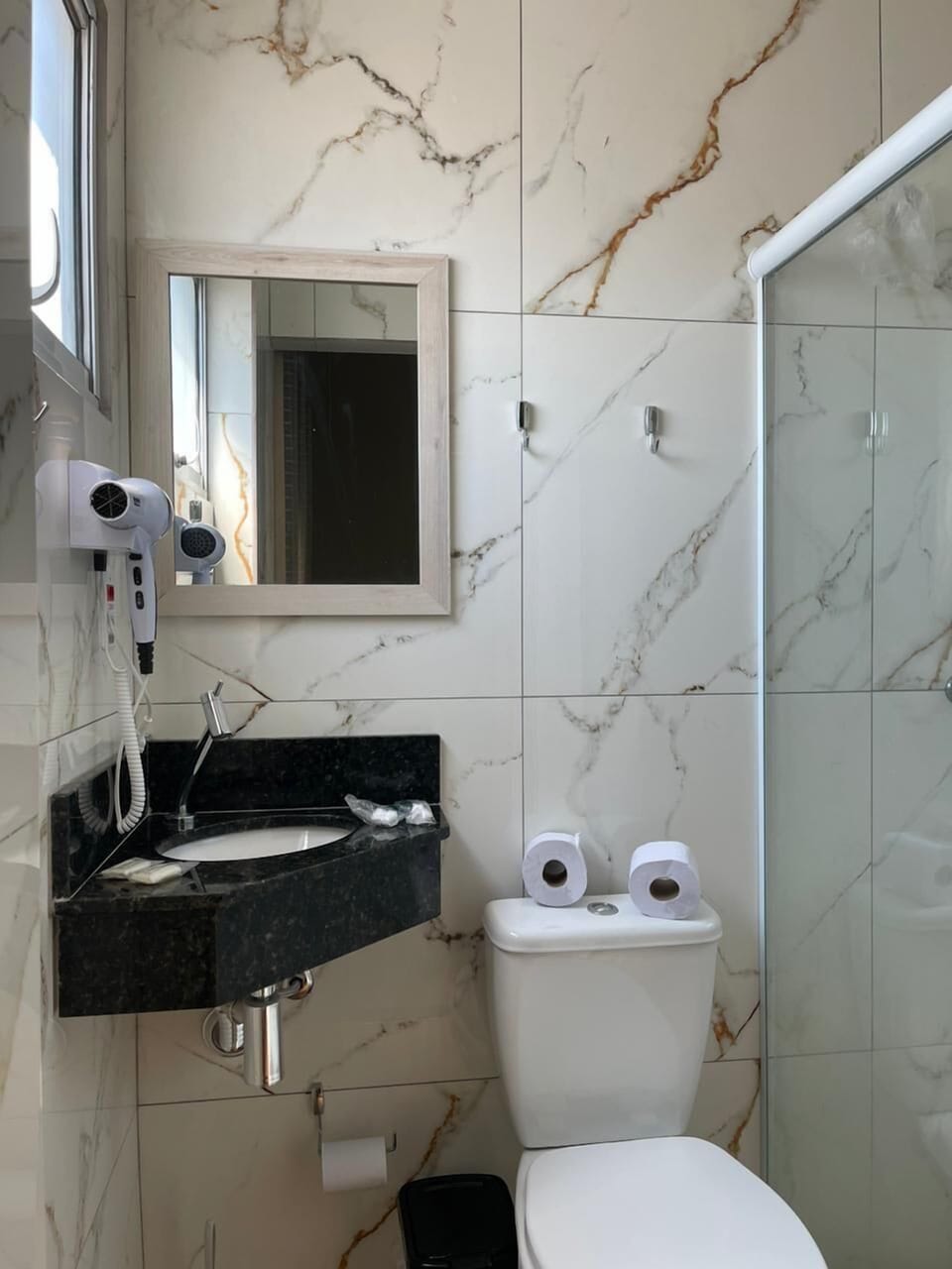 Shower, free toiletries, hair dryer, towels