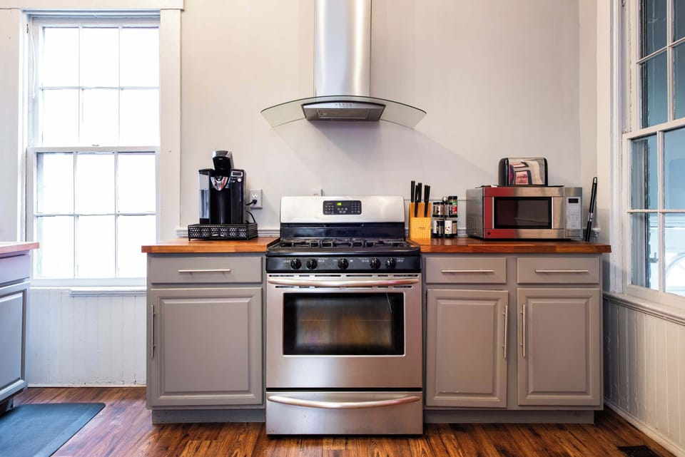 New appliances with Icoffee machine with K-cups, creamers, and sugars. 