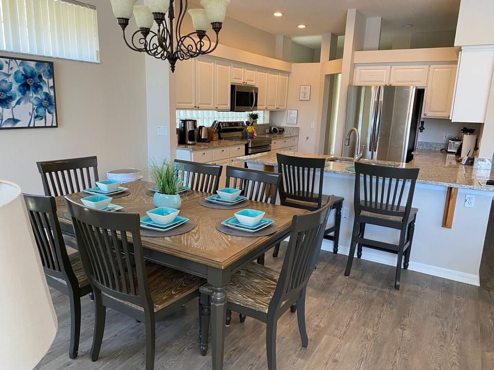 Dining and kitchen bar - all stainless steel appliances..