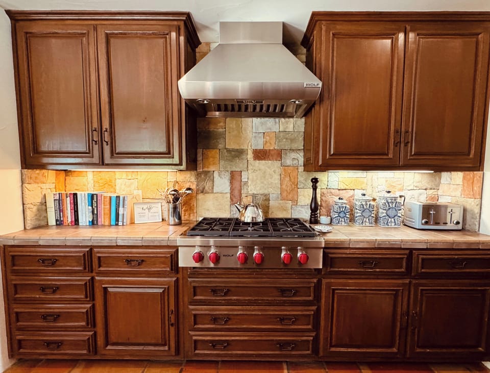 Kitchen Features Wolf Professional And Sub-Zero Appliances Including Double Oven