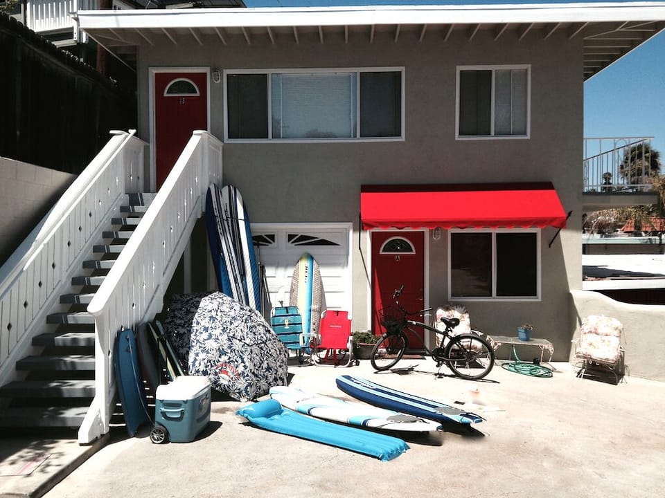 It is the upstairs unit with balcony and beach gear