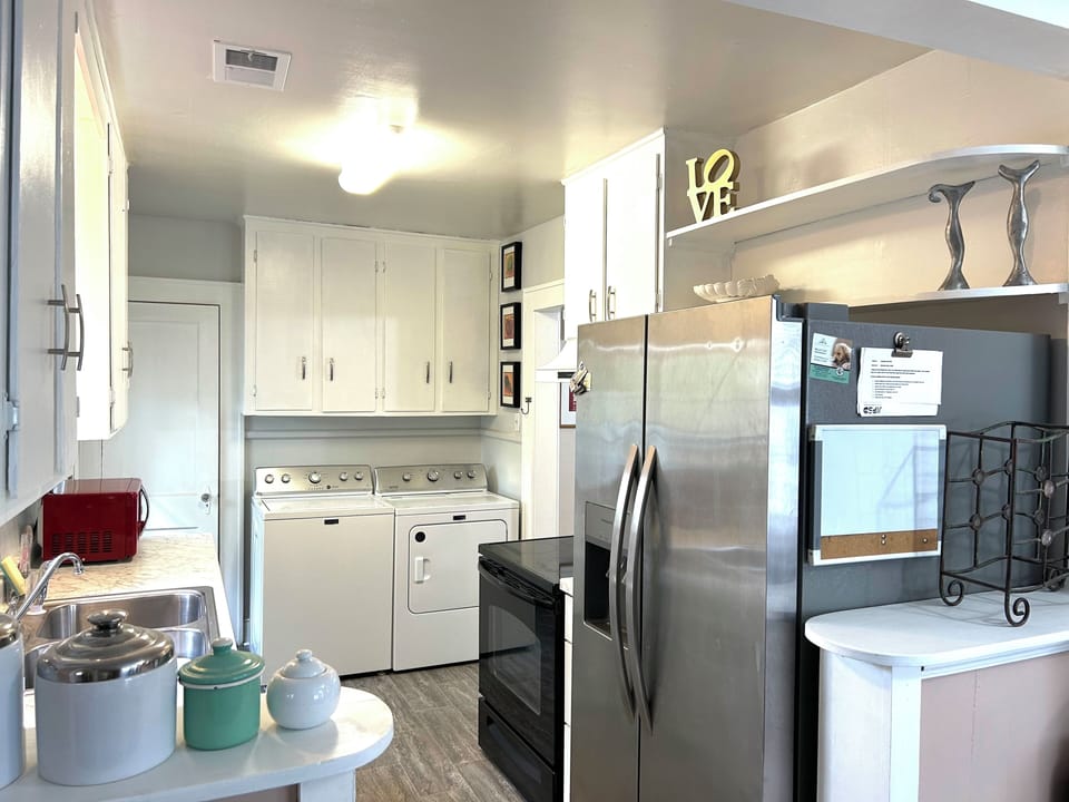 All new kitchen with laundry facilities and stocked pantry. 