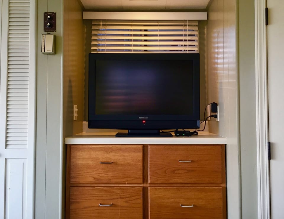 Captains quarters closet and flatscreen HDTV