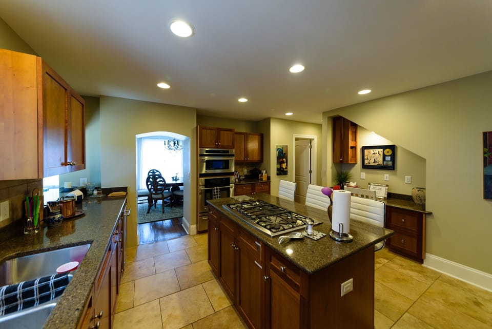 Kitchen features pantry, icemaker, beverage fridge, microwave, warming drawer...