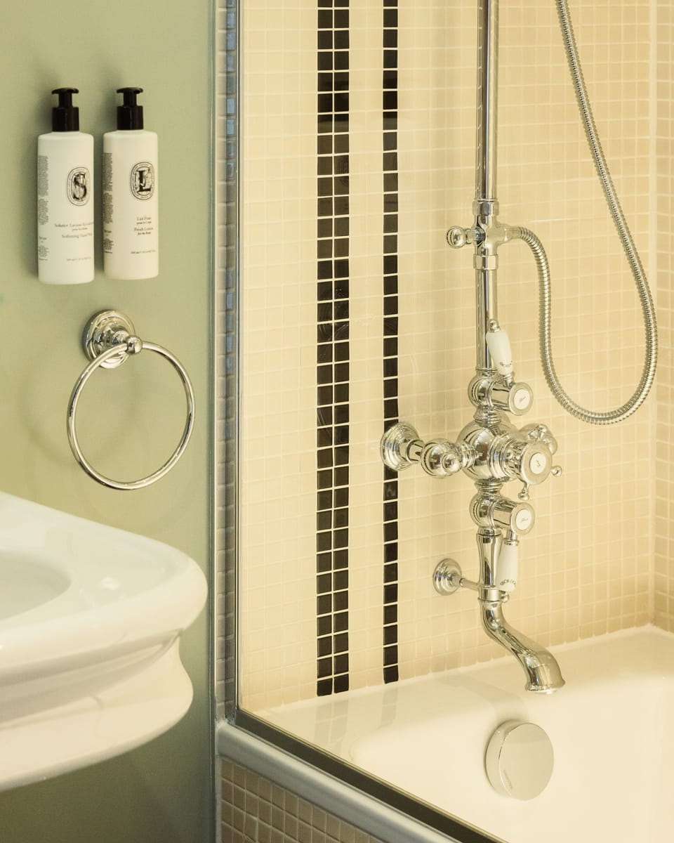 Hair dryer, slippers, towels, soap