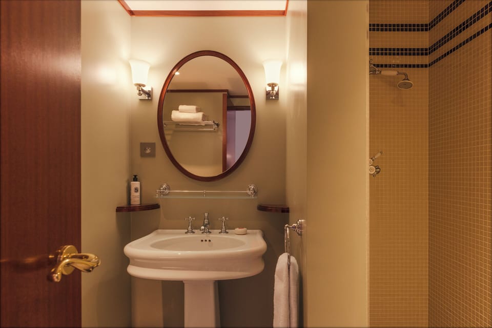 Hair dryer, slippers, towels, soap
