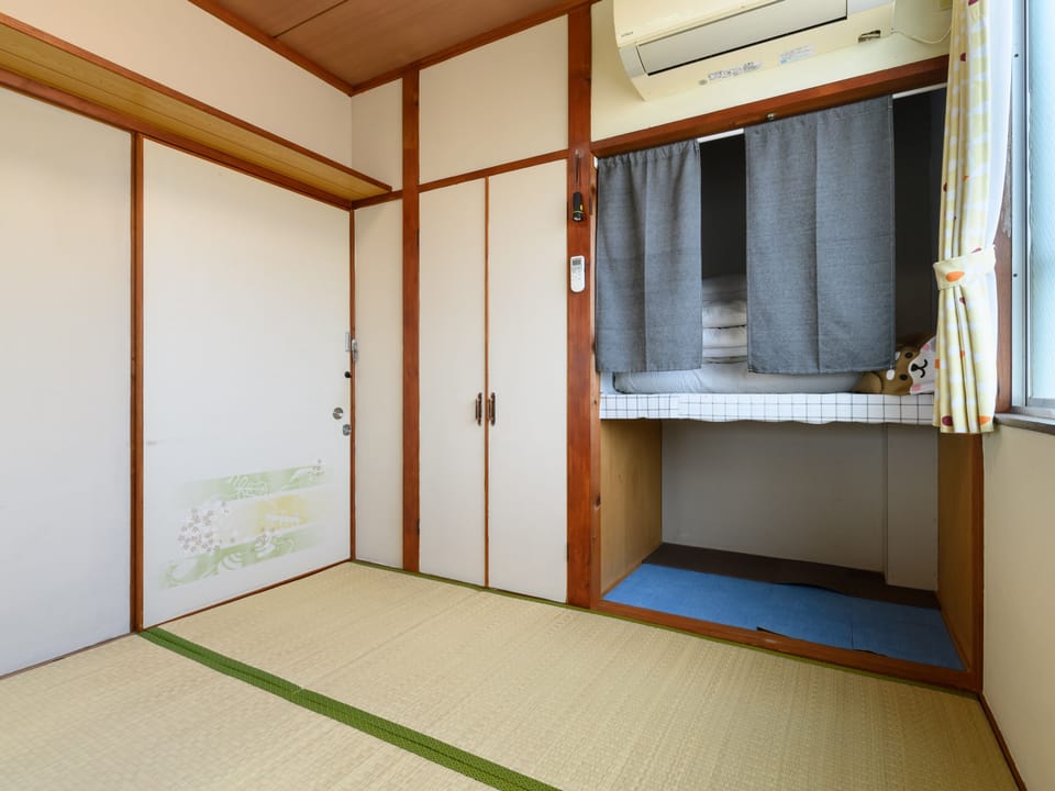 Japanese Room- Single Occupancy with Shared Washroom (Non Smoking) No co-sleeping allowed | Free WiFi, bed sheets
