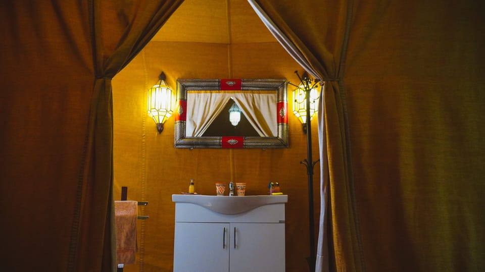 Shower, rainfall showerhead, eco-friendly toiletries, towels