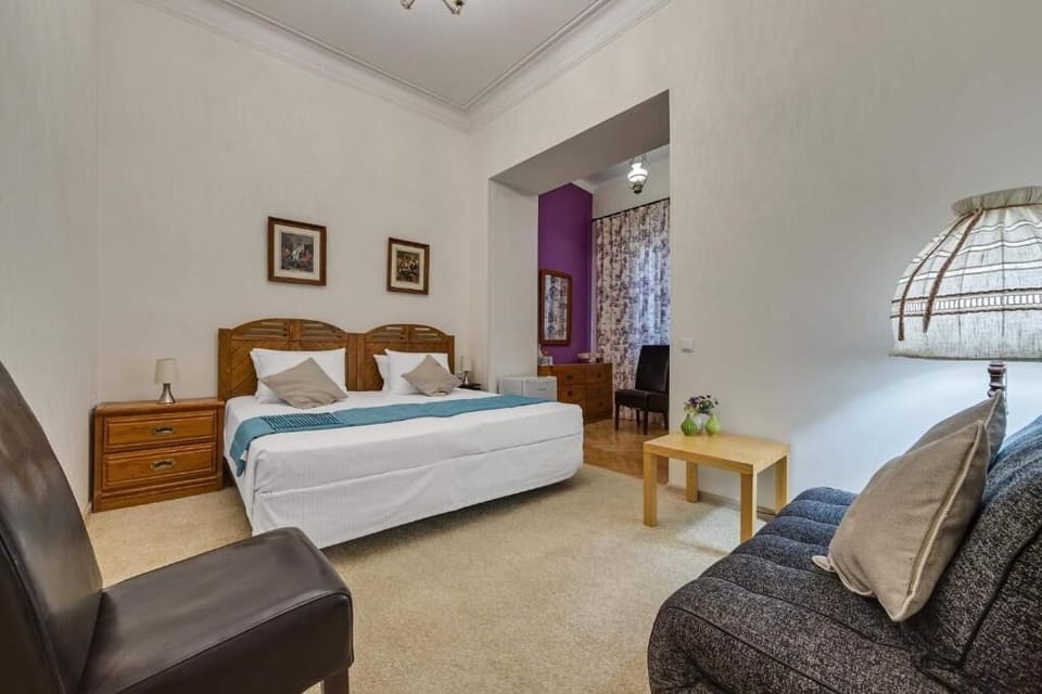 Deluxe Double or Twin Room | Living area | Flat-screen TV