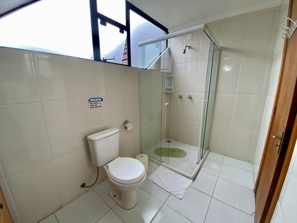 Quadruple Room | Bathroom | Shower, free toiletries, hair dryer, towels