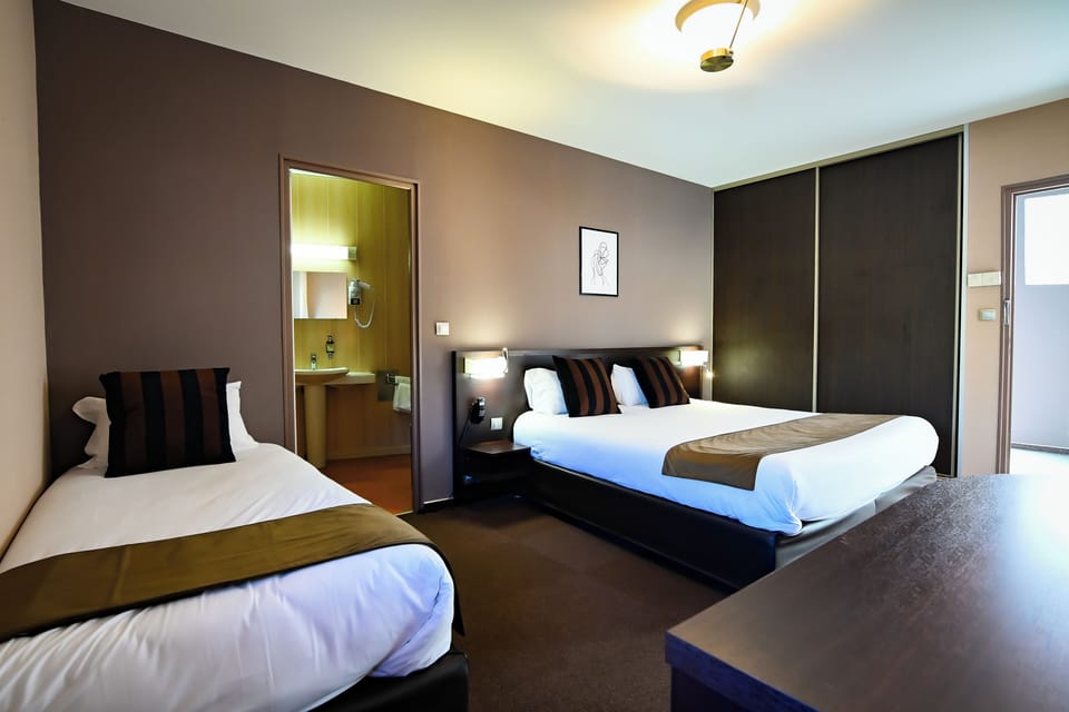 Triple Room, Pool View | Minibar, in-room safe, desk, blackout drapes