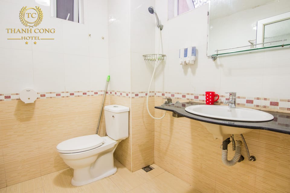 Shower, free toiletries, slippers, towels