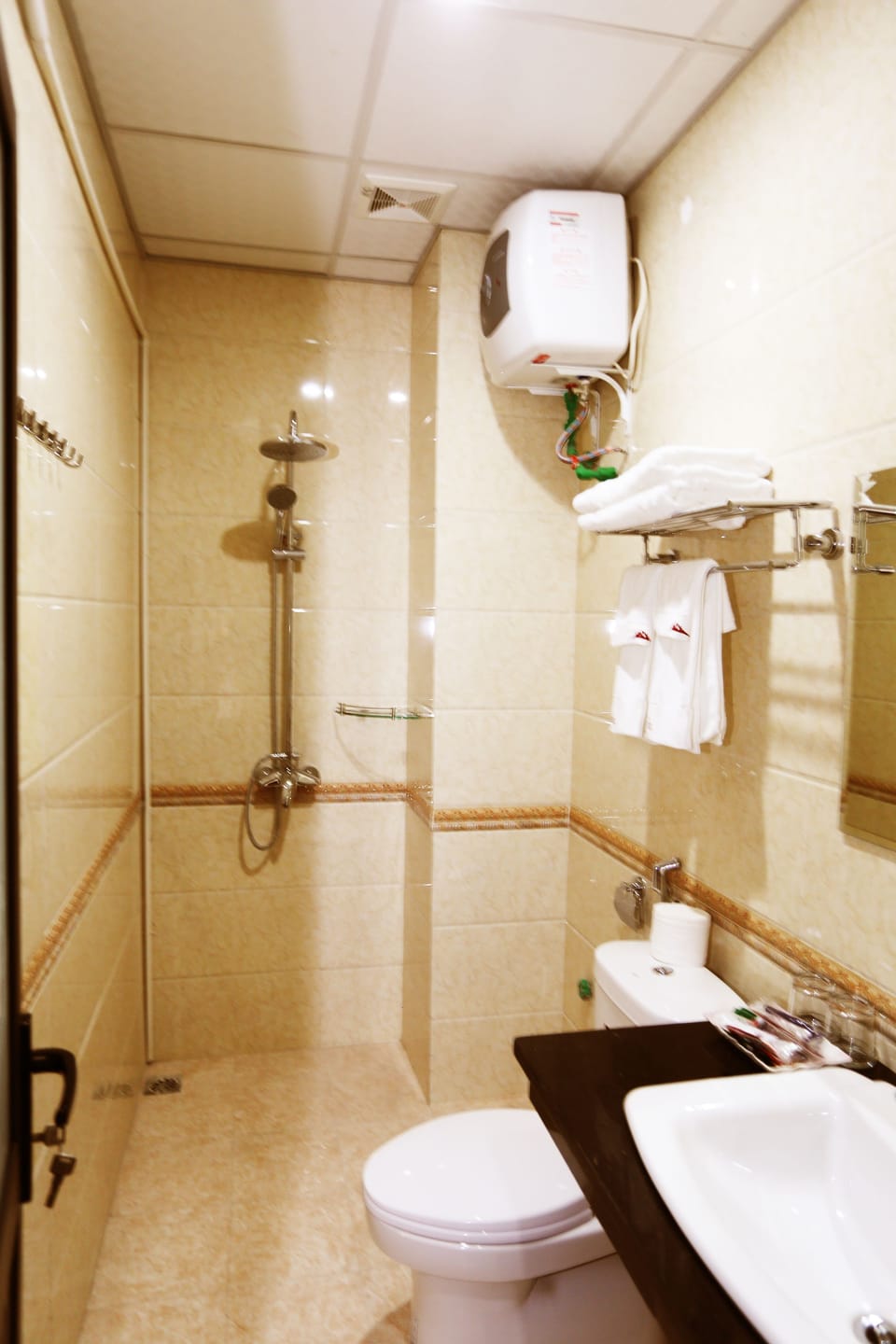Shower, free toiletries, hair dryer, slippers