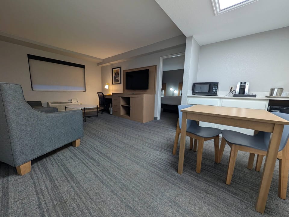 Suite, Multiple Beds, Non Smoking | Desk, laptop workspace, iron/ironing board, free WiFi