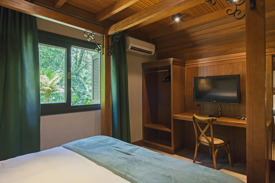 Chalet, Bathtub (Fioreze) | 1 bedroom, minibar, desk, blackout drapes