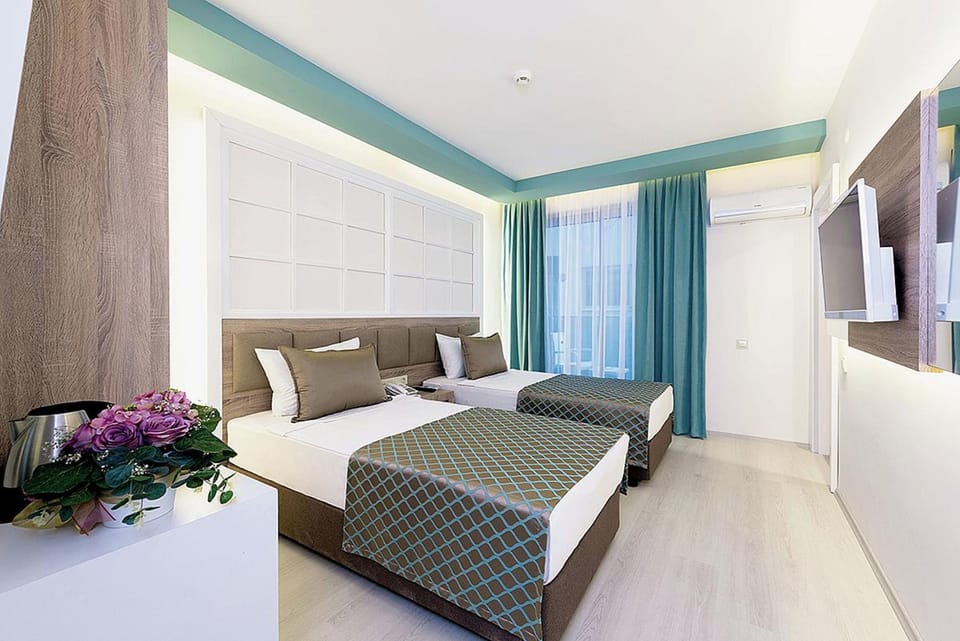 Free minibar items, desk, WiFi, bed sheets