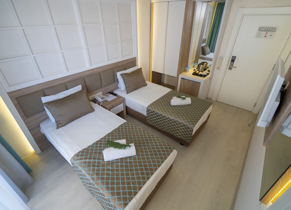 Free minibar items, desk, WiFi, bed sheets