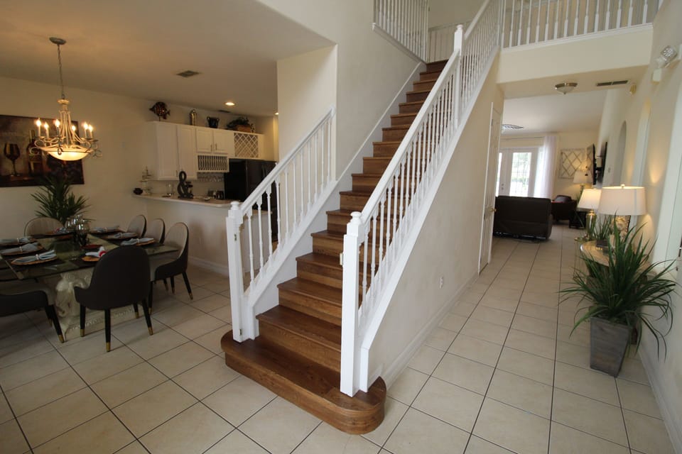 Spacious hall leading and stairs leading to the next level.