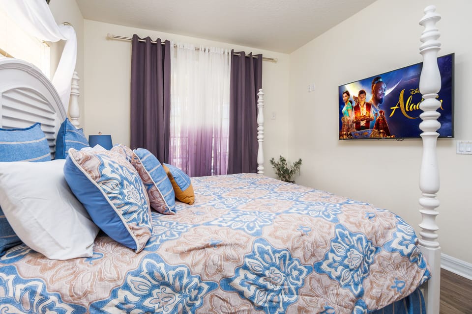 King bedroom with 65 in TV