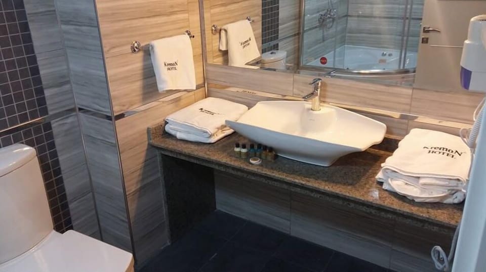 Shower, free toiletries, hair dryer, slippers