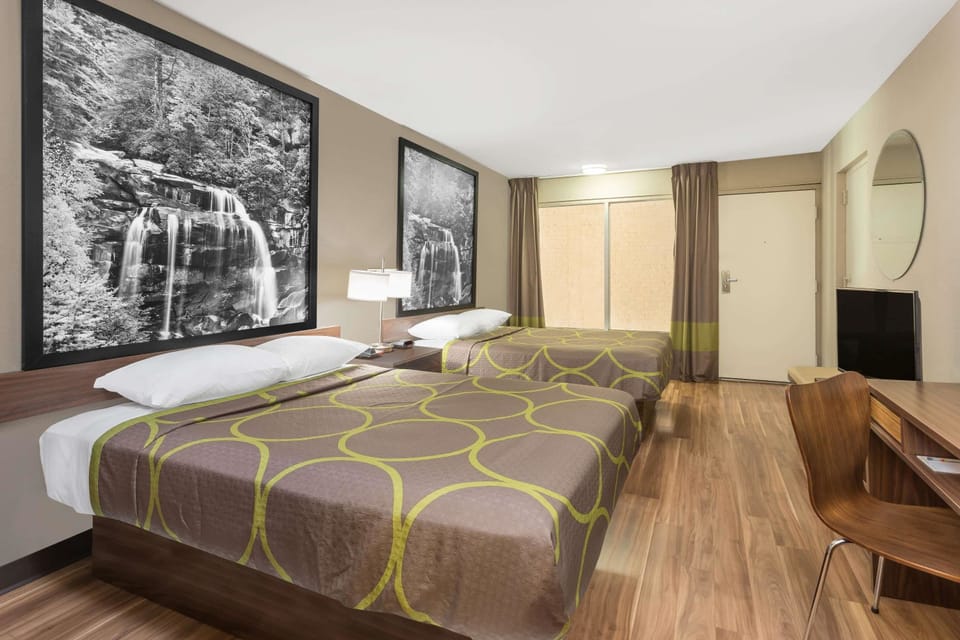 Desk, soundproofing, iron/ironing board, free cribs/infant beds