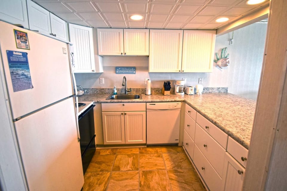 Condo, 2 Bedrooms | Private kitchen | Fridge, microwave, dishwasher, coffee/tea maker