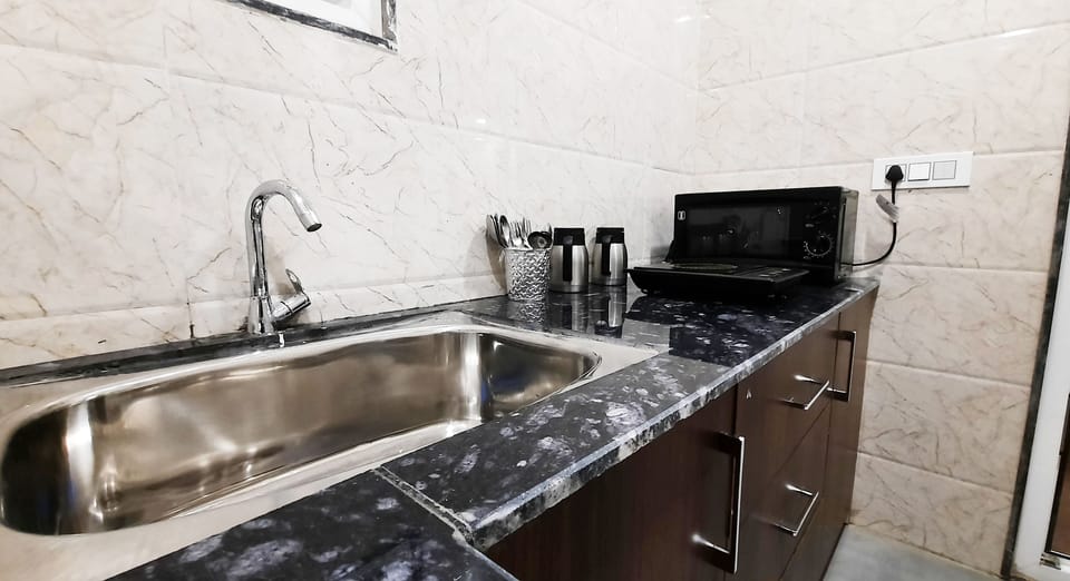 Superior Double or Twin Room | Private kitchen | Fridge, coffee/tea maker, electric kettle