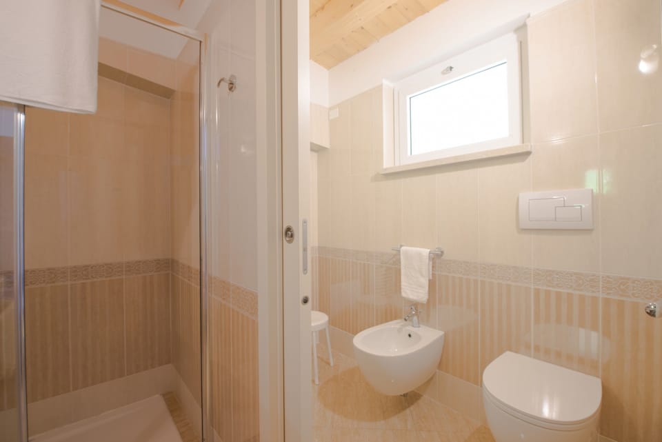 Junior Suite, 1 Bedroom | Bathroom | Shower, free toiletries, hair dryer, bidet