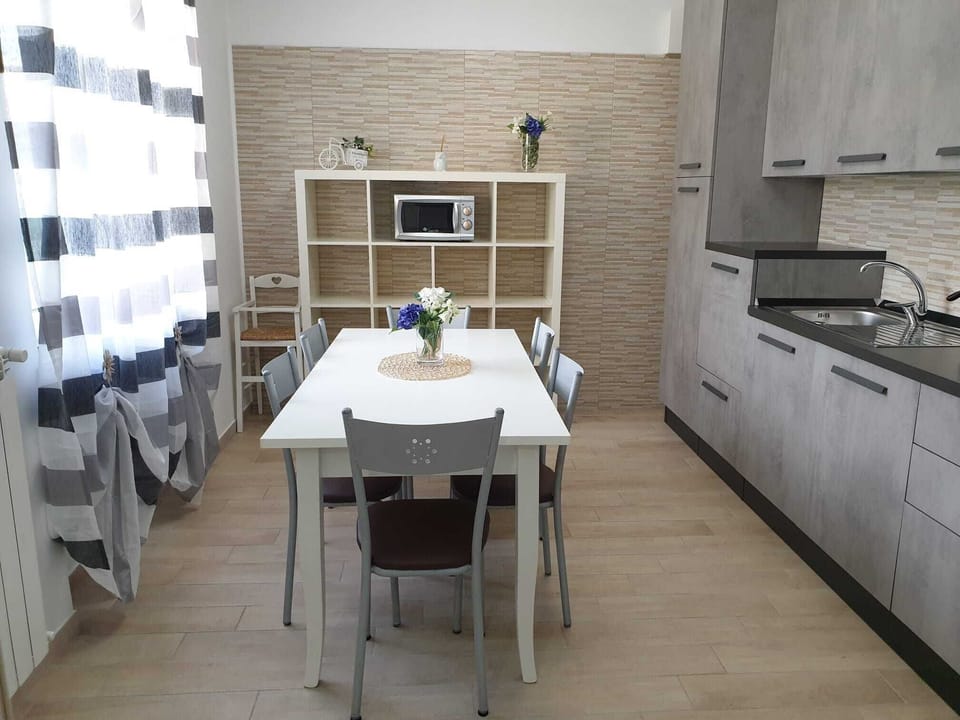 Family Apartment, 1 Bedroom, Mountain View | Private kitchen | Full-size fridge, microwave, espresso maker, highchair