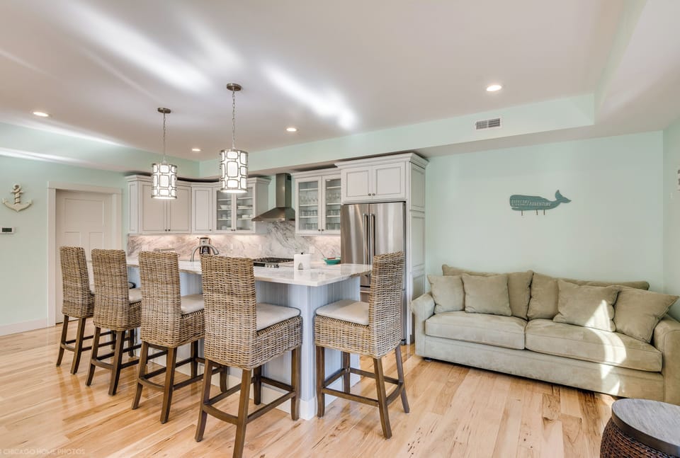 Look At All that seating! Another sofa is by kitchen so that the cooks can enjoy