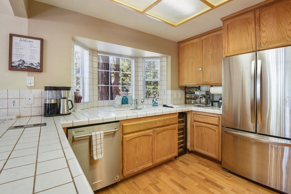 Kitchen is well stocked with appliances