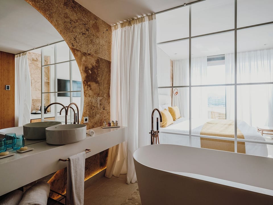 Premier Room, Terrace, Bay View | Bathroom | Combined shower/tub, rainfall showerhead, designer toiletries