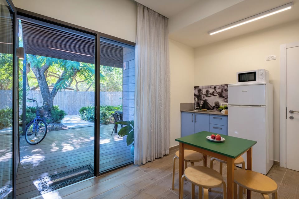 Family Room, 2 Bedrooms | Living area | Flat-screen TV